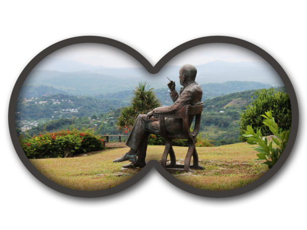Durchs Fernglas eine Figur eines Mannes, der über die weiten Berge Jamaicas blickt, anschauen